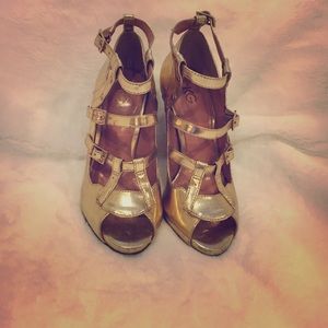 Gold strappy heels by Kurt Geiger